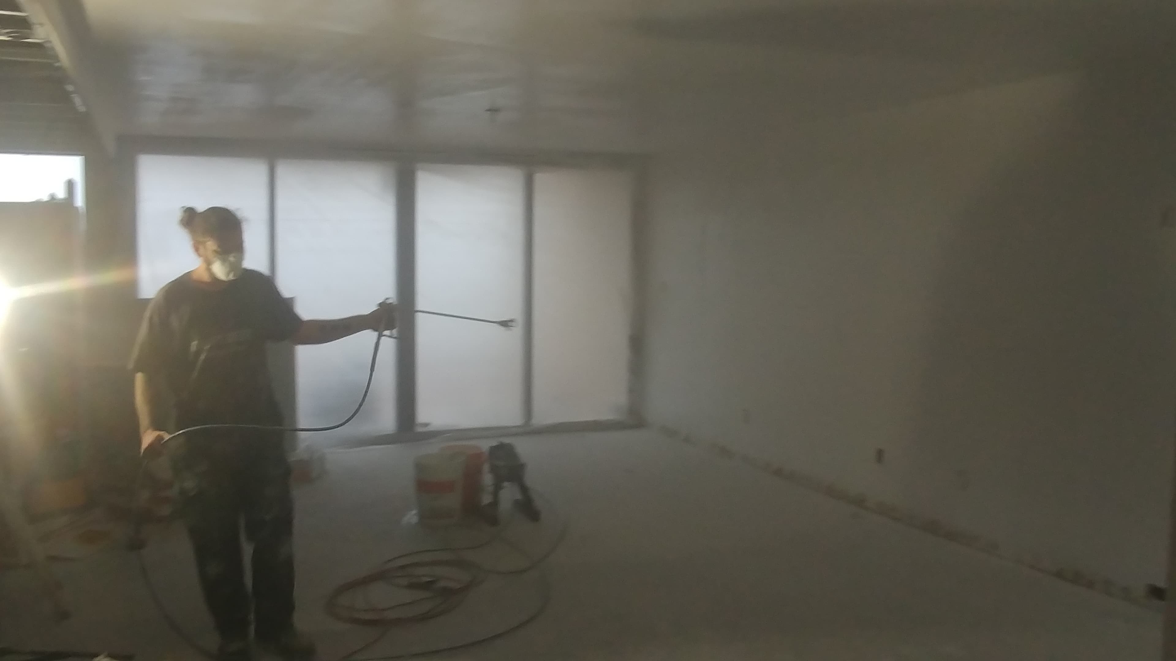 Contractors On Call painter working on a St. Petersburg interior